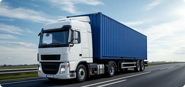 Modern freight container semi-truck driving on highway