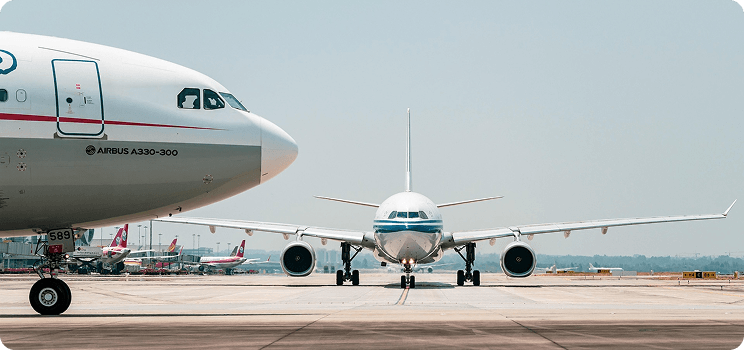 Air freight cargo aircraft at airport runway